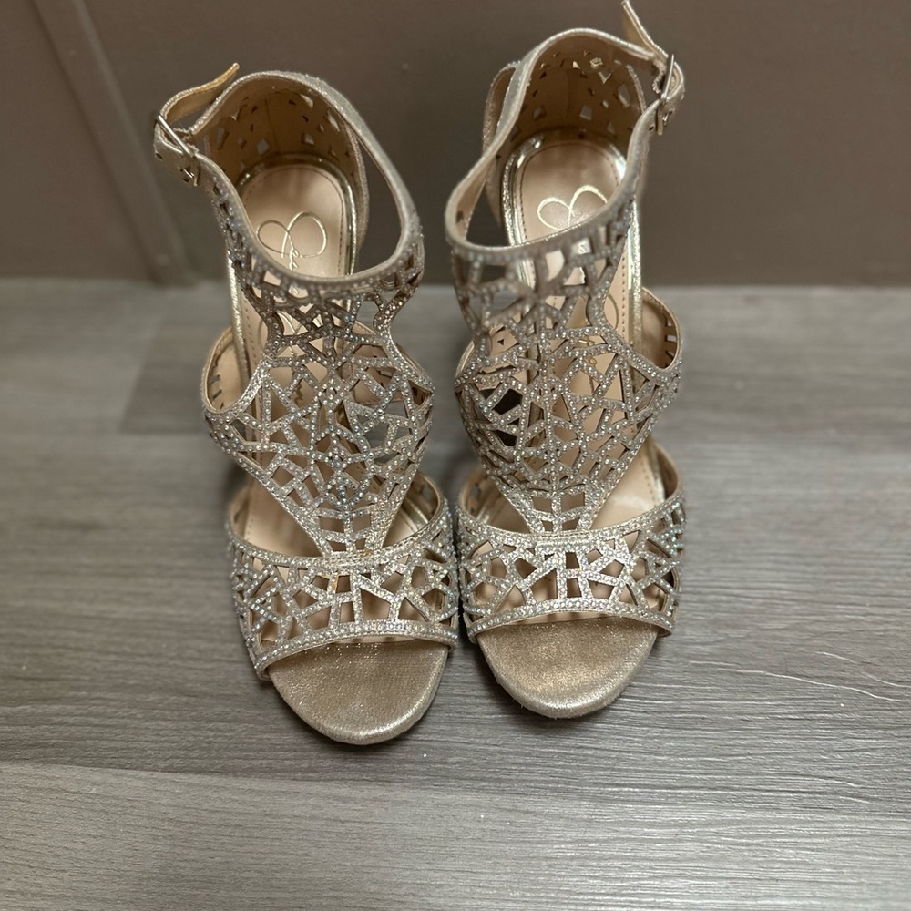 Jessica Simpson heels. Barely used. Size 6.5 gold with t strap